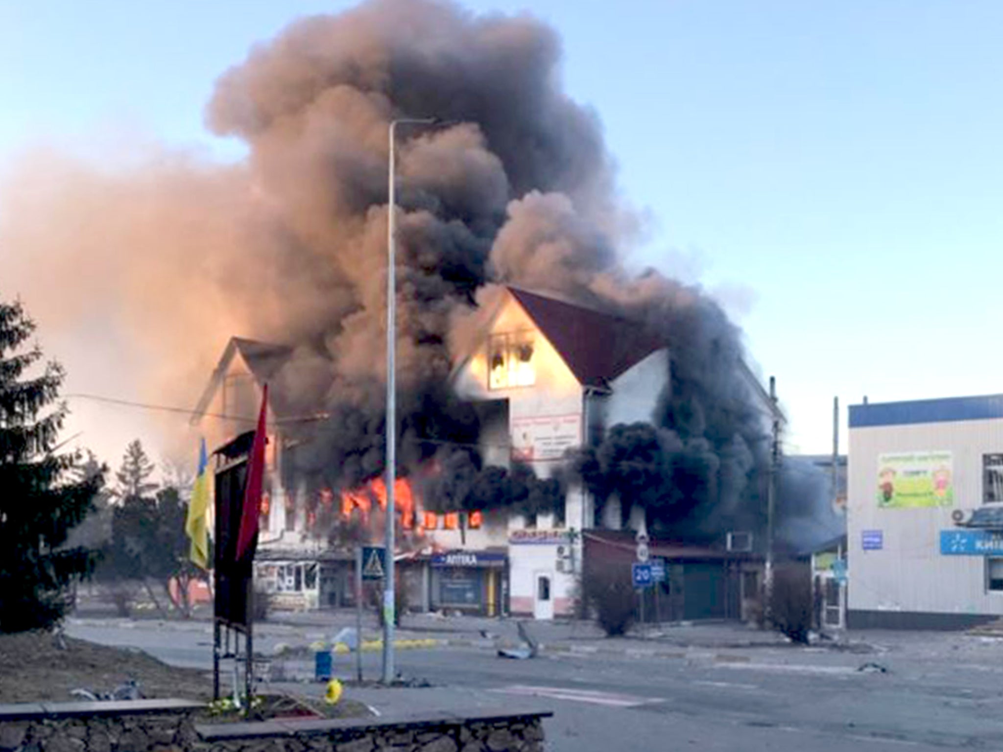 A blaze engulfs a commercial building as Russian shelling continues