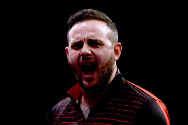 <p>Joe Cullen during his match with Gary Anderson </p>