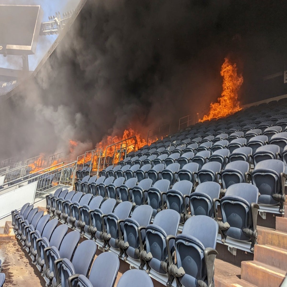 Significant' blaze torches seats and sparks evacuation at NFL stadium in  Denver