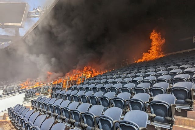 <p>Roaring flames and heavy smoke engulf part of Empire Field at Mile High stadium</p>