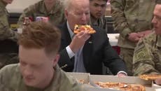 Biden eats pizza with US soldiers in Poland