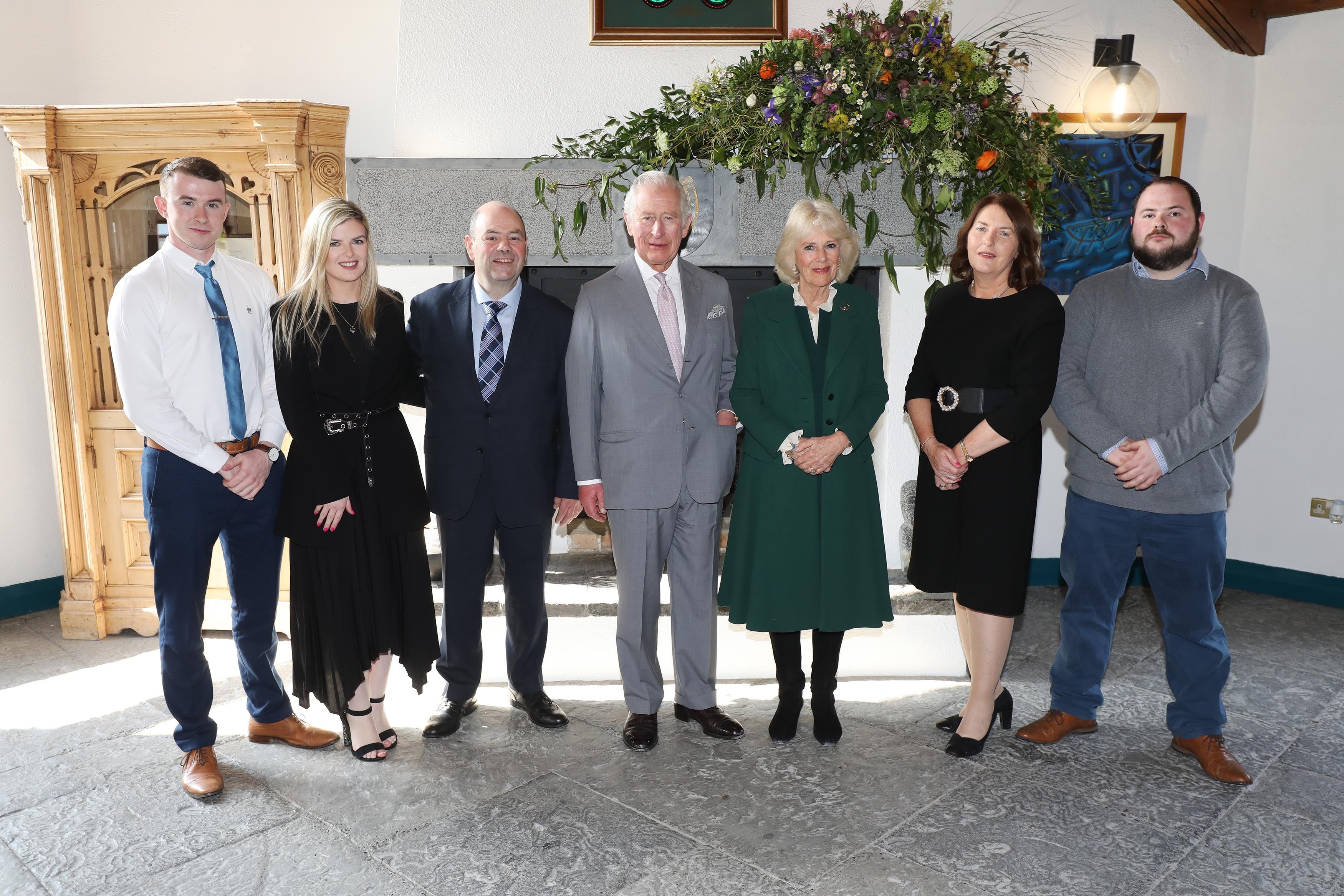 The Prince of Wales and the Duchess of Cornwall alongside the family of Ashling Murphy at the Bru Boru Cultural Centre in Cashel, Co Tipperary (Julien Behal Photography/PA)