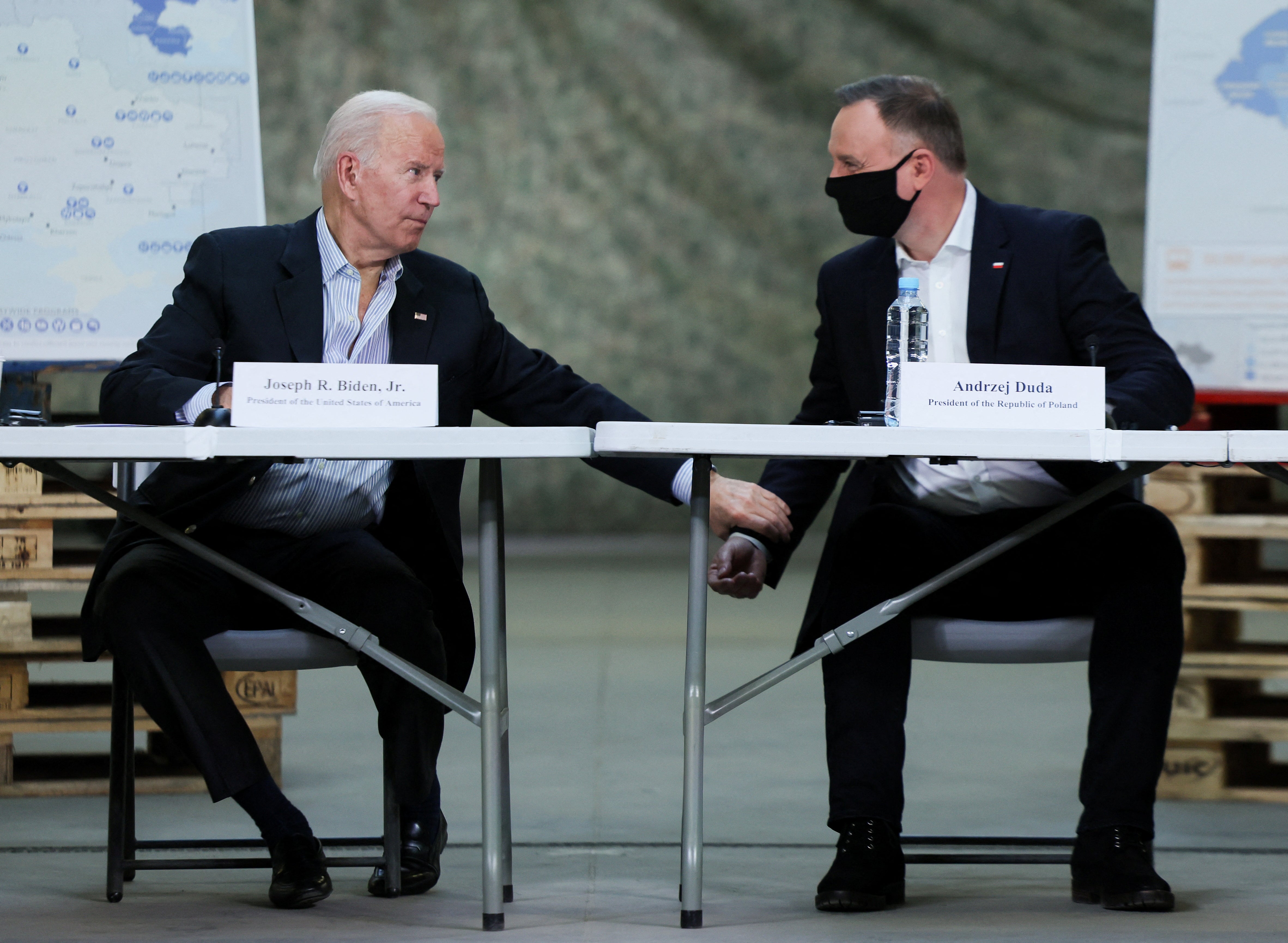 President Joe Biden and Poland’s President Andrzej Duda attend a briefing on humanitarian efforts for Ukraine, at Rzeszow-Jasionka Airport