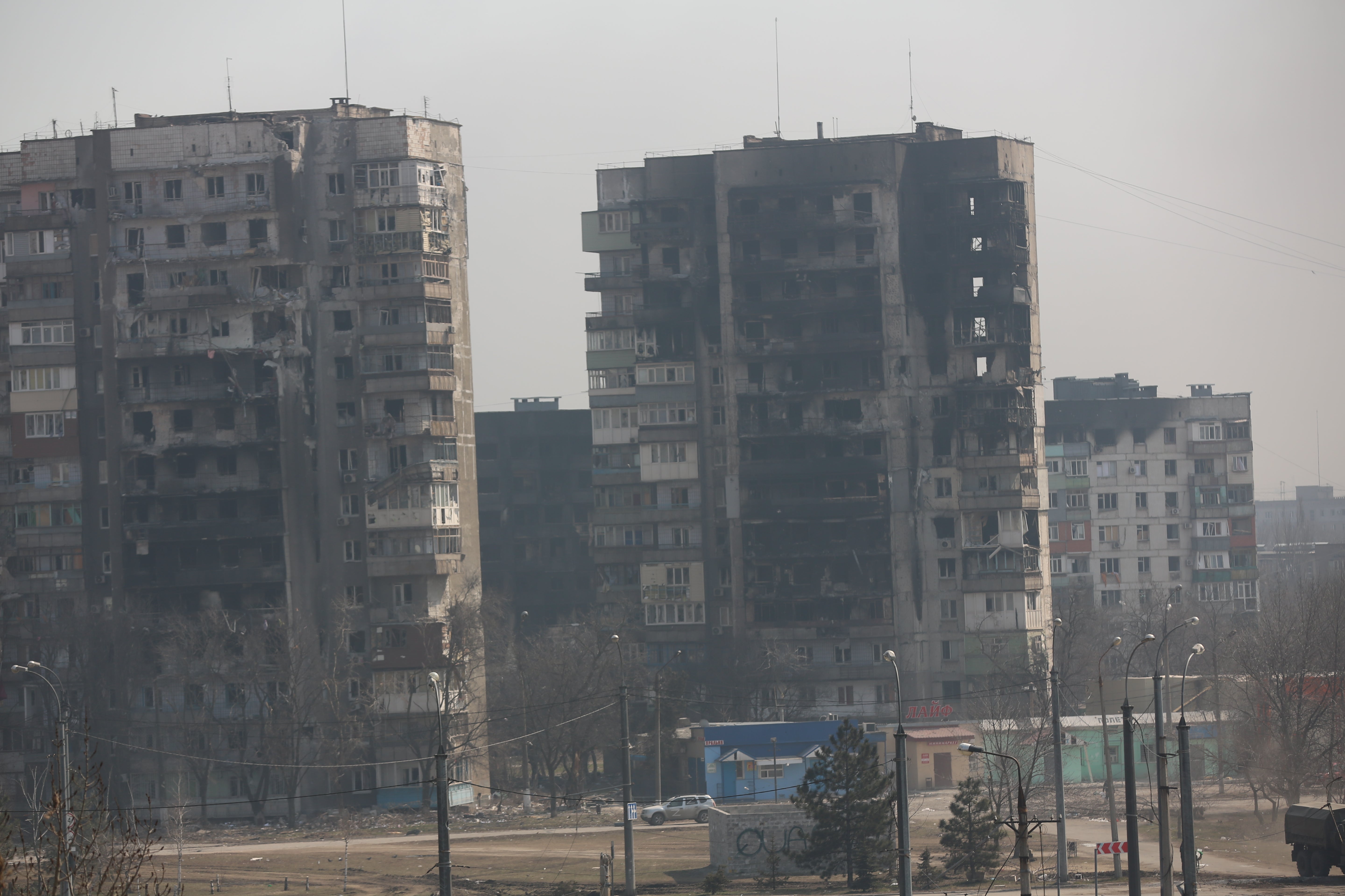 Damaged buildings in Mariupol, from where civilians are being evacuated along humanitarian corridors