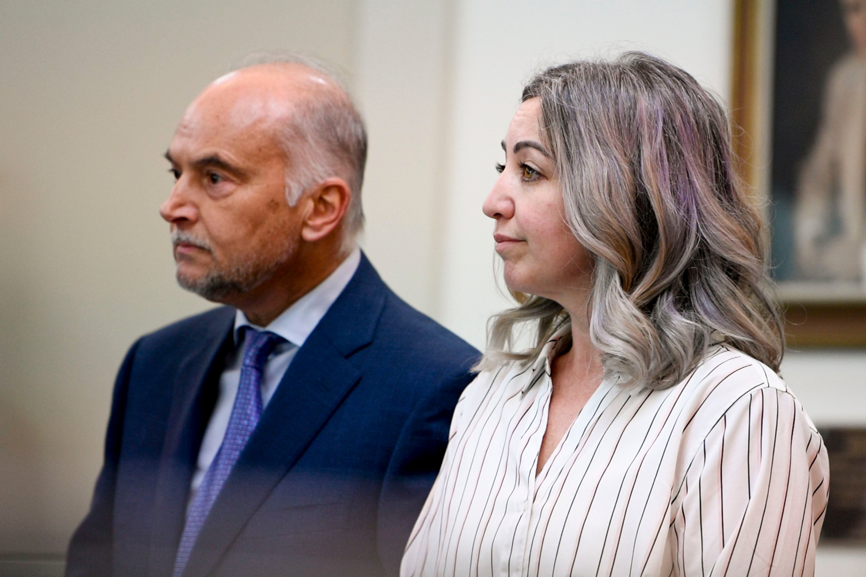 RaDonda Vaught and her attorney Peter Strianse listen as verdicts are read at the end of her trial in Nashville, Tenn., on Friday, March 25, 2022.