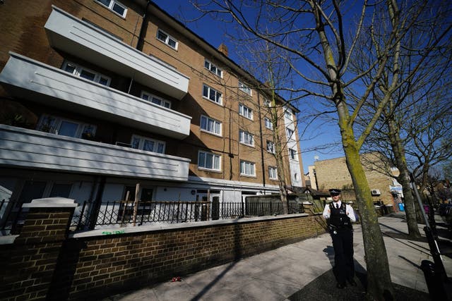 A police officer outside a property in Globe Road, Bethnal Green, east London (Aaron Chown/PA)