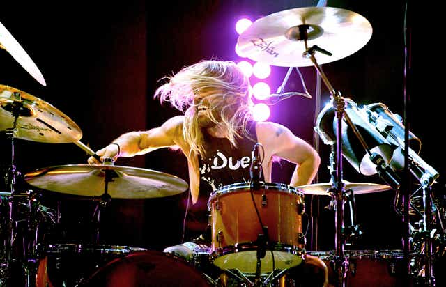 <p>Taylor Hawkins, with his constant grin that made you happy just to look at him, was truly iconic</p>
