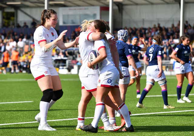 <p>Leanne Infante celebrates with teammates after scoring England’s sixth try</p>