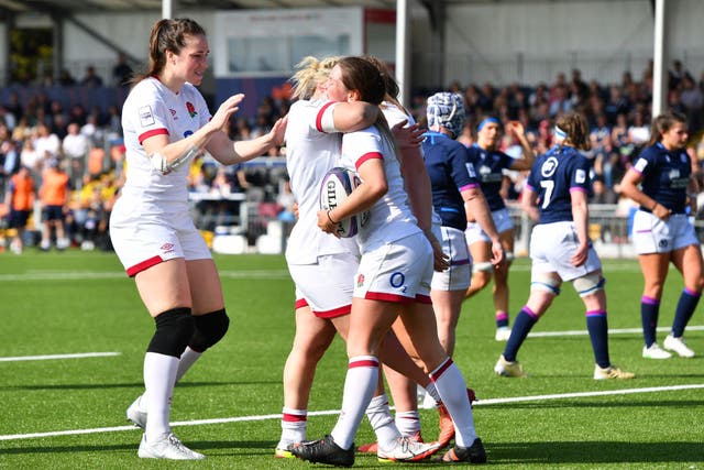 <p>Leanne Infante celebrates with teammates after scoring England’s sixth try</p>