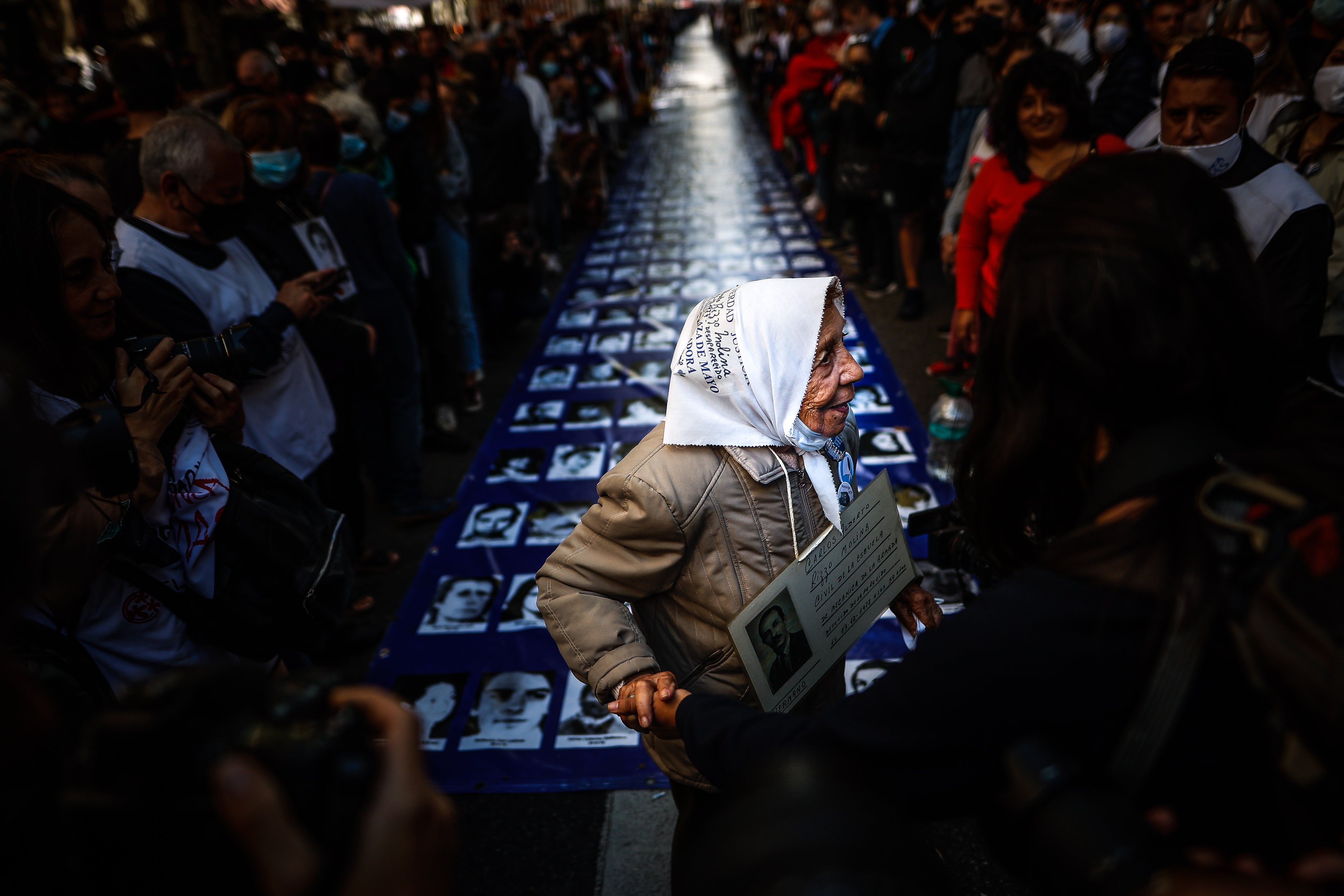 A member of the Mothers of Plaza de Mayo participates with thousands of other people in a march for the National Day of Memory for Truth and Justice, which commemorates the 1976 military coup in Buenos Aires, earlier this month