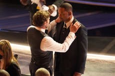 Oscars 2022: Will Smith consoled by Denzel Washington, Tyler Perry and Bradley Cooper after he hits Chris Rock
