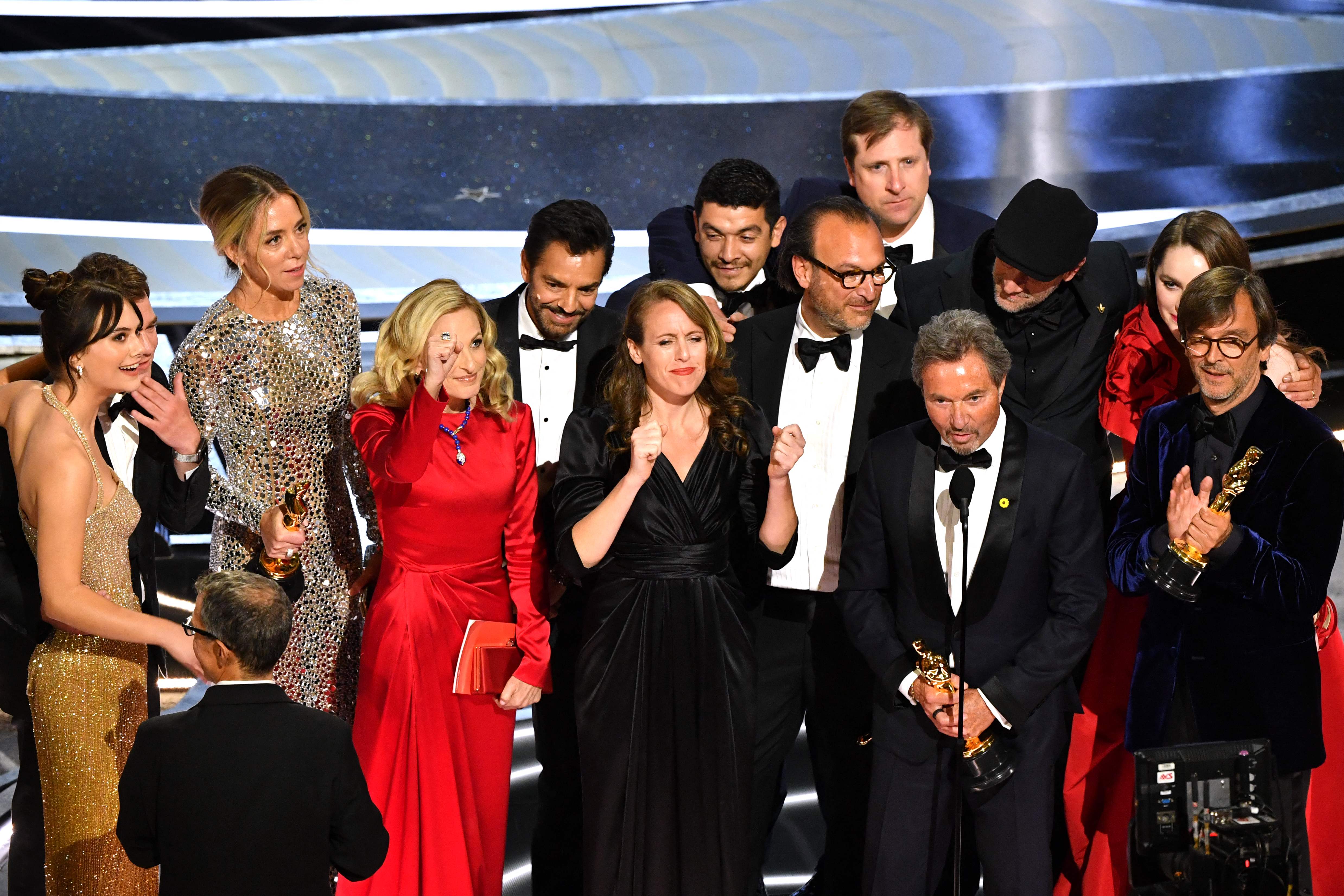 ‘Coda’ cast and crew accept the award for Best Picture onstage during the 94th Oscars at the Dolby Theatre in Los Angeles