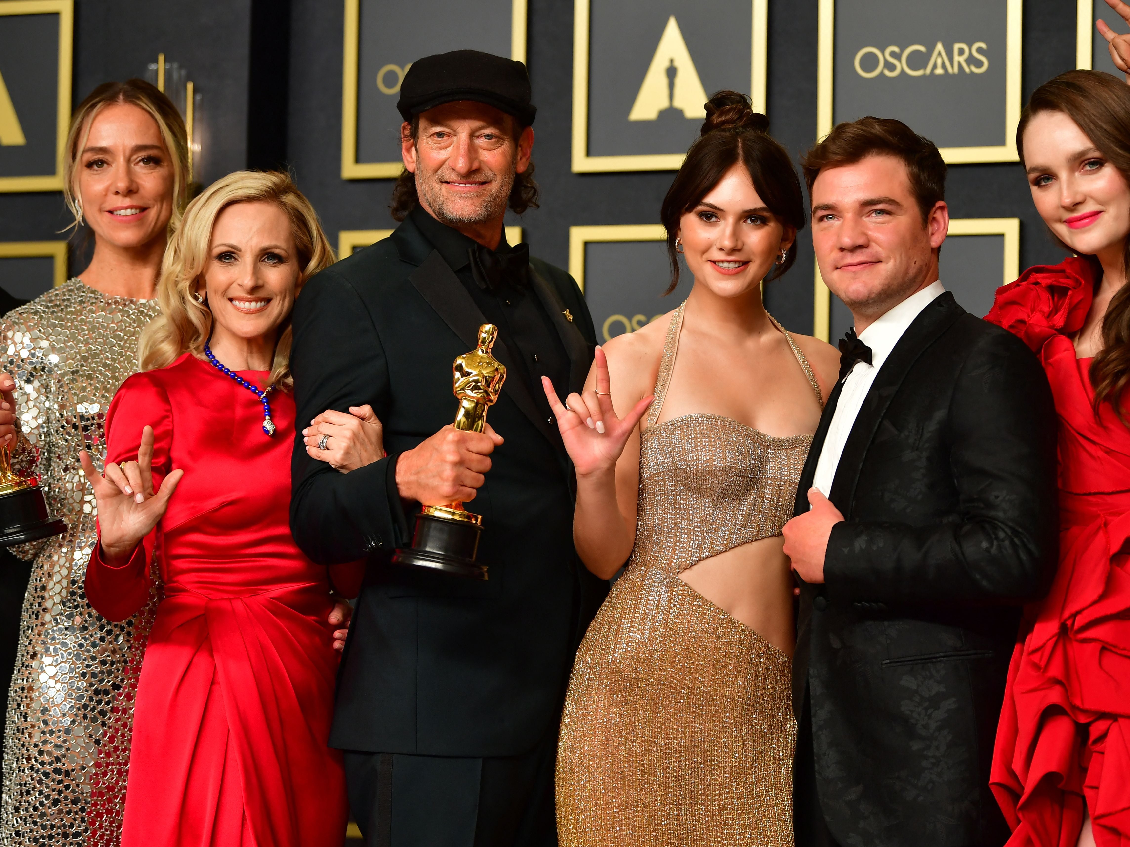 <p>The cast of ‘Coda’ celebrating their Oscars success after the live ceremony </p>