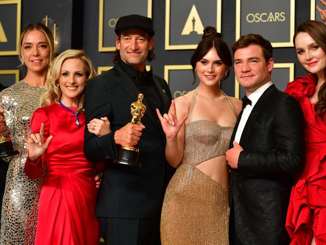 <p>The cast of ‘Coda’ celebrating their Oscars success after the live ceremony </p>