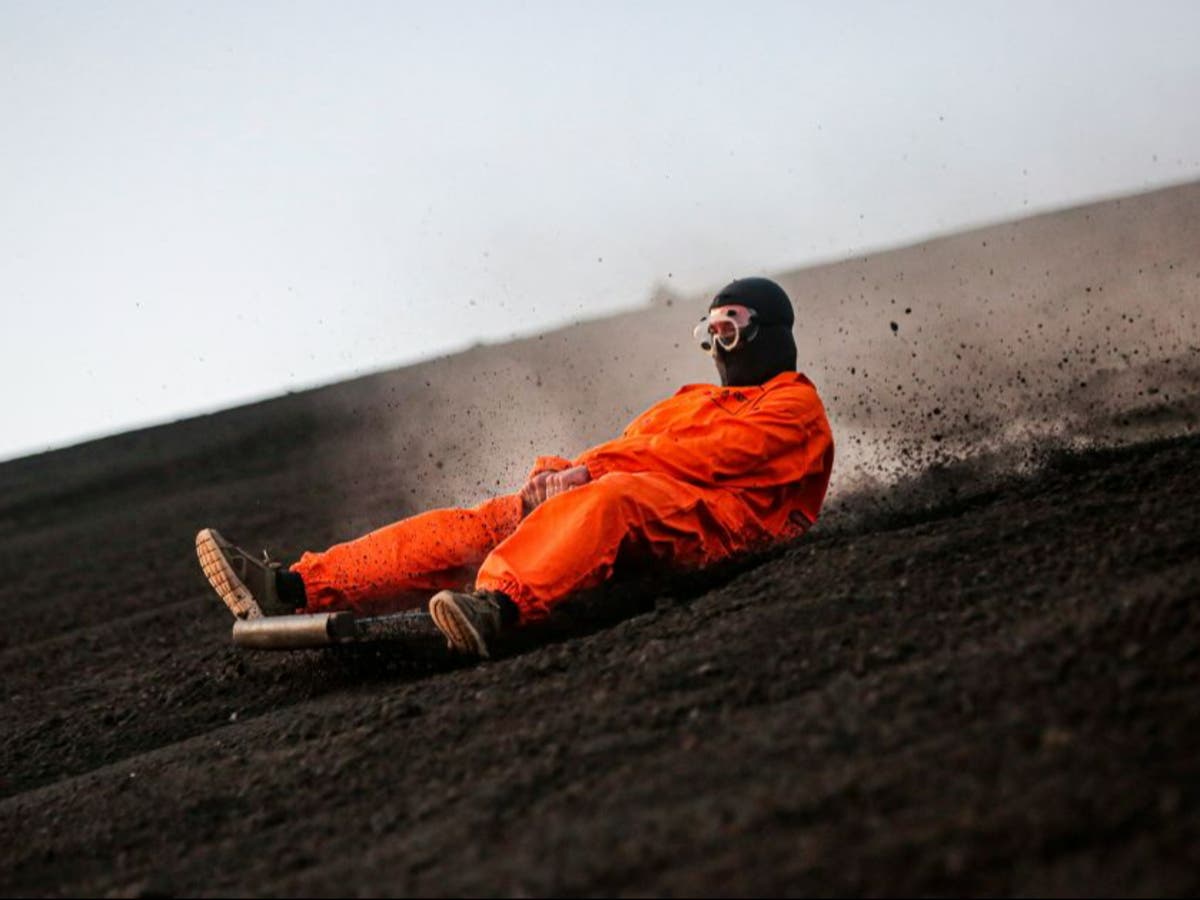 &lsquo;Volcano boarding&rsquo; sees adrenaline junkie tourists slide down slopes of active powder keg in Nicaragua