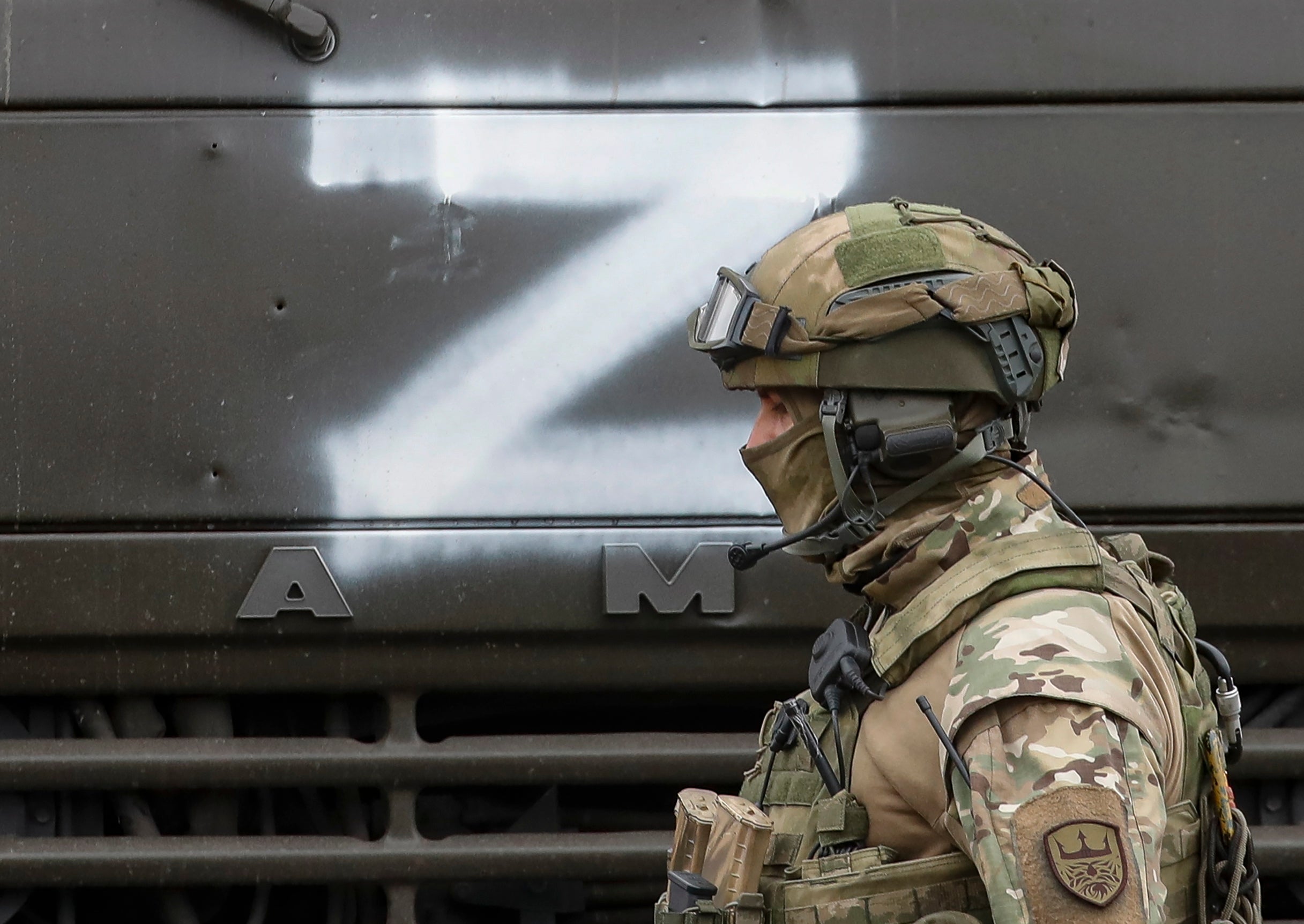 A Russian soldier in the village of Trokhizbenka in the Luhansk region of Ukraine