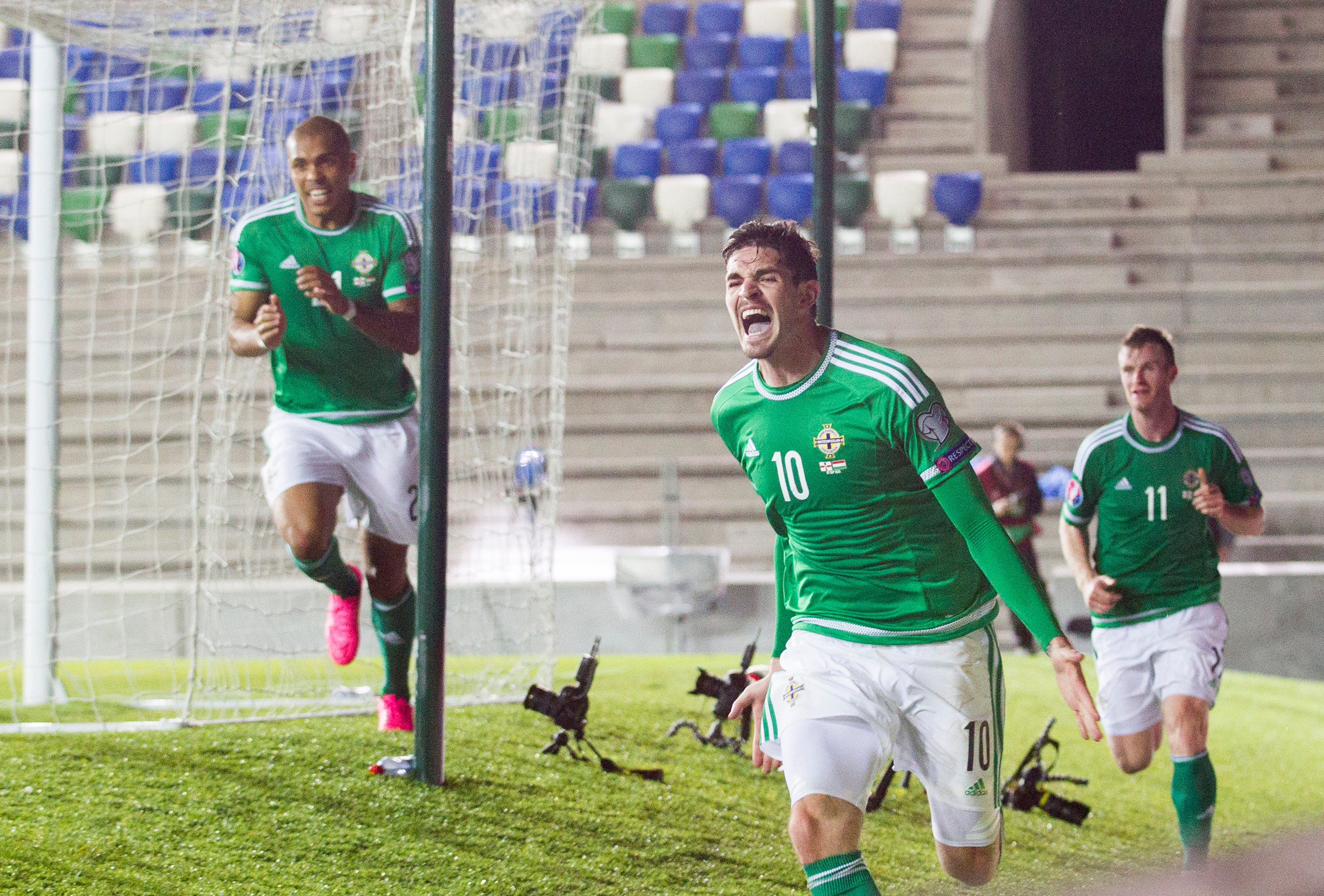 Kyle Lafferty celebrates his goal against Hungary at Windsor Park (Liam McBurney/PA)