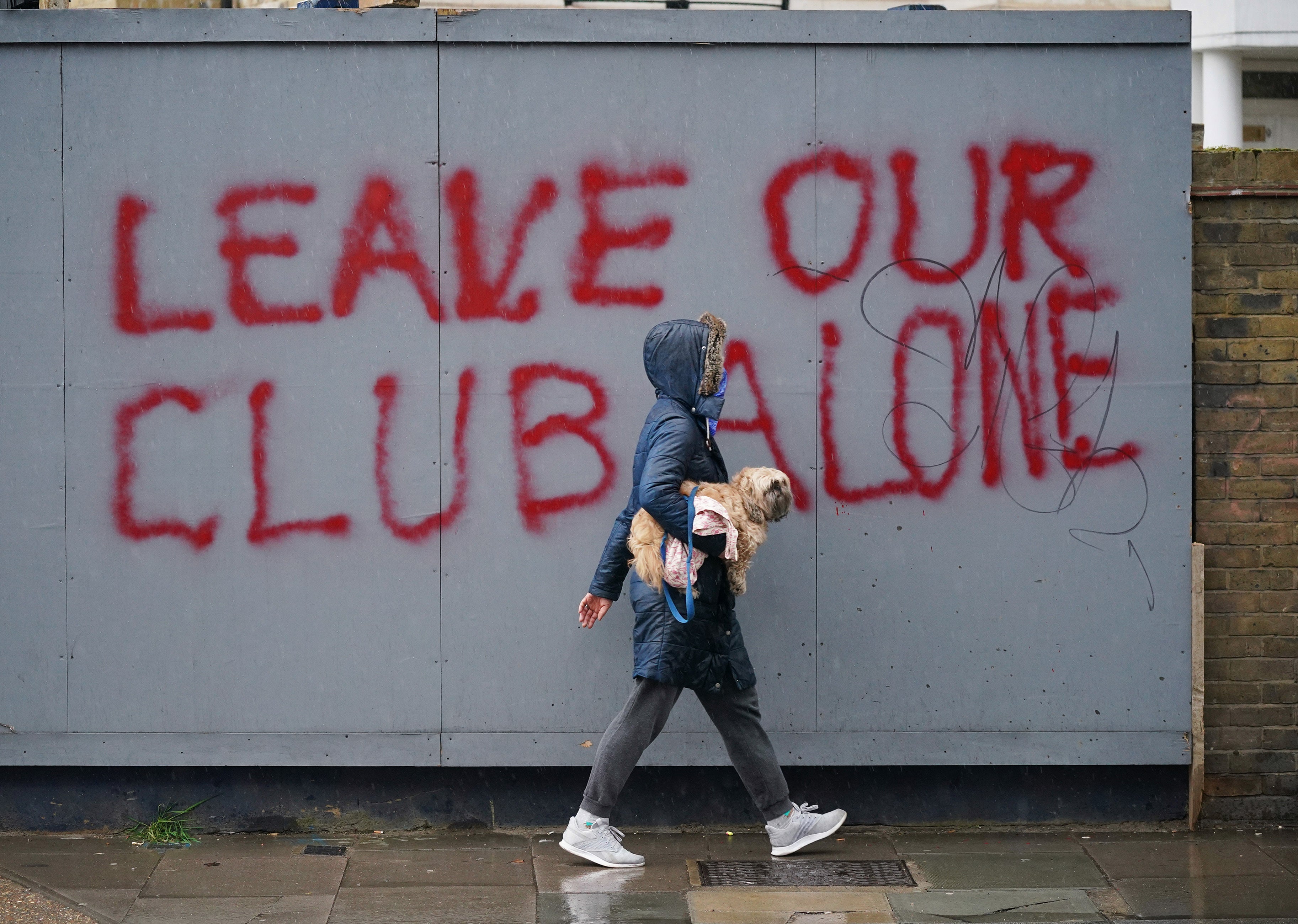 Graffiti close to Stamford Bridge makes clear fan frustrations on the terms of Chelsea’s new Government operating licence (Yui Mok/PA)