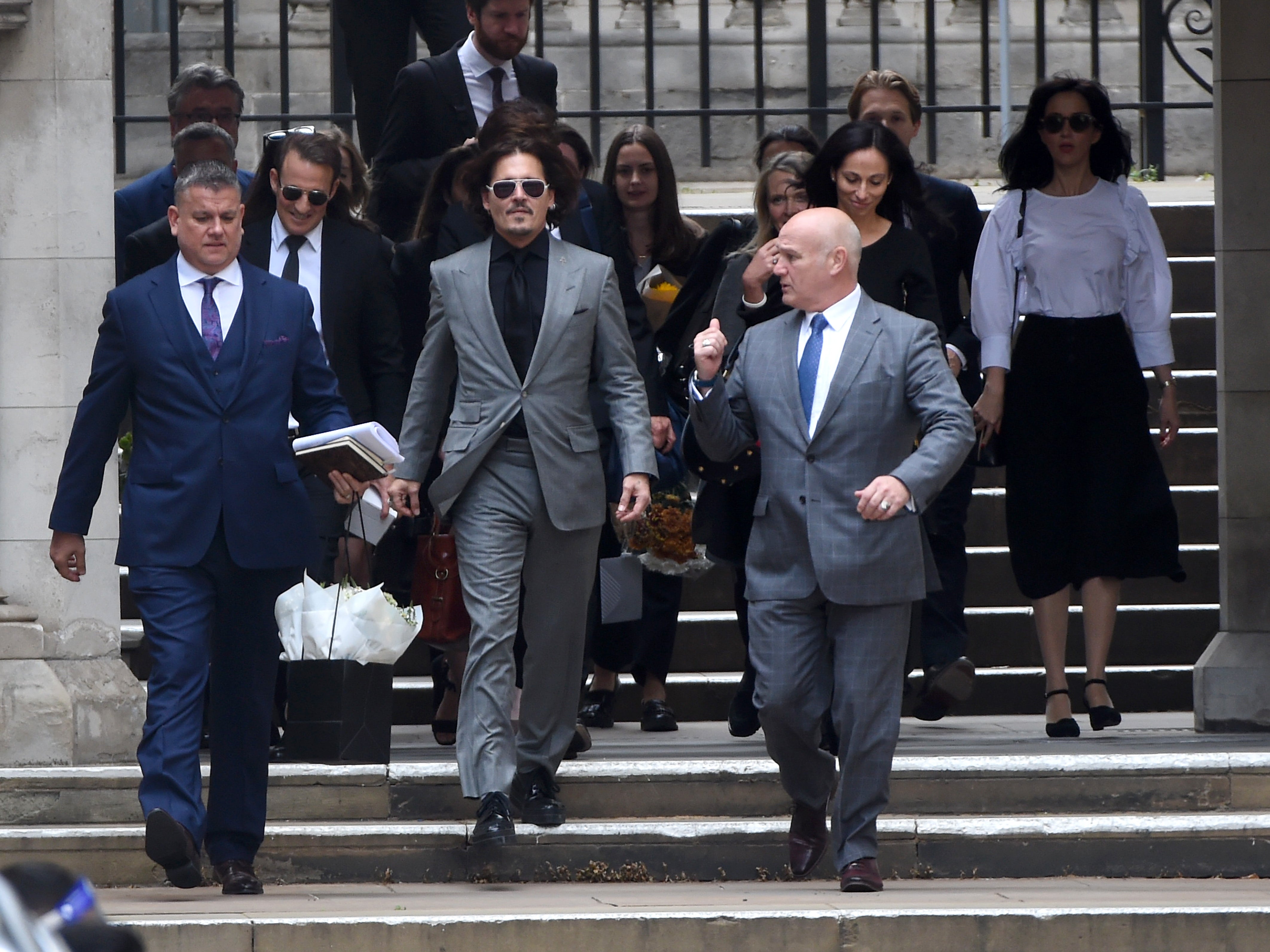Johnny Depp departs from the court on 28 July 2020 in London