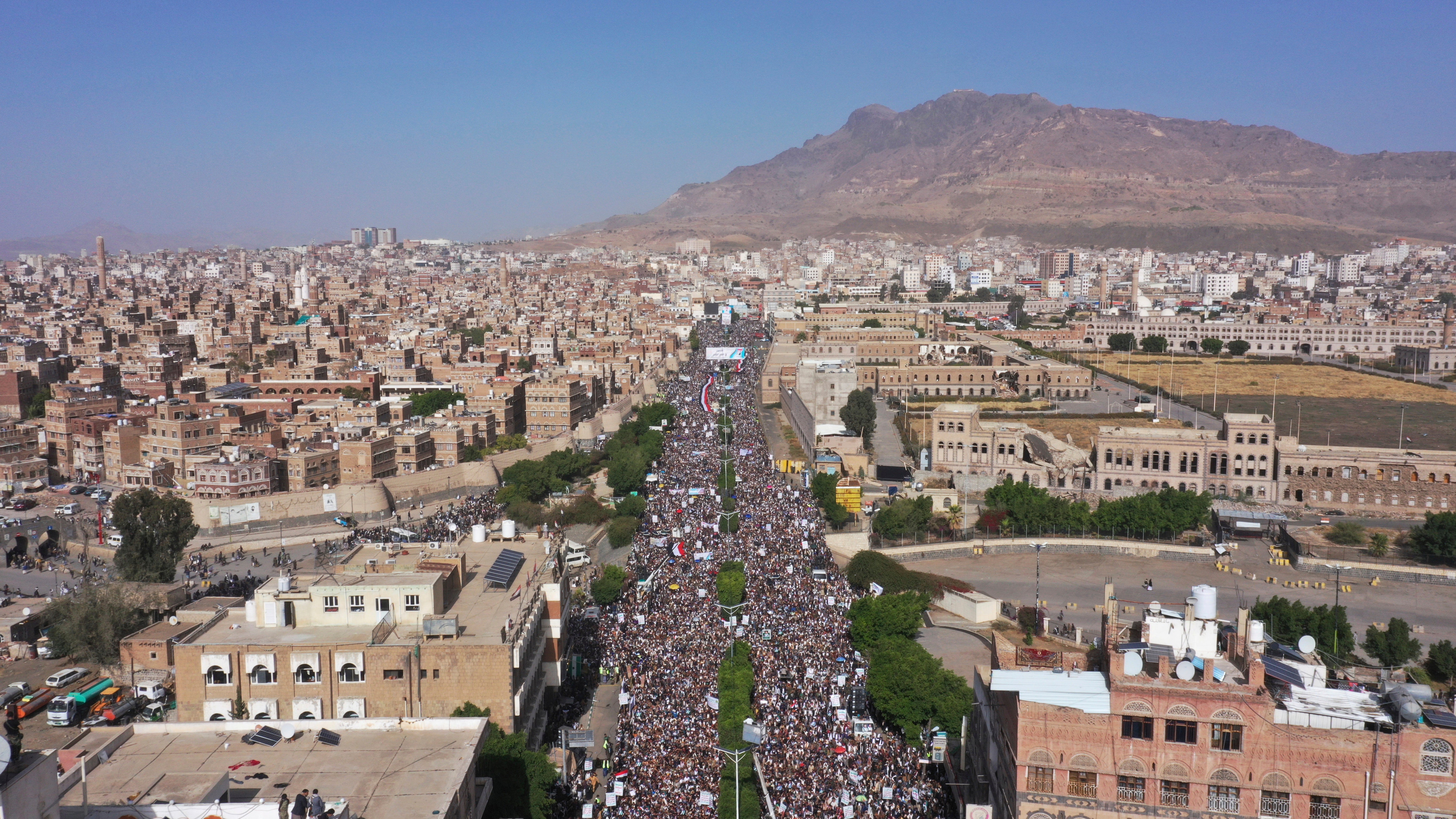 Houthi supporters attend a rally marking the seventh anniversary of the Saudi-led coalition's intervention in Yemen's war in Sanaa, Yemen, Saturday
