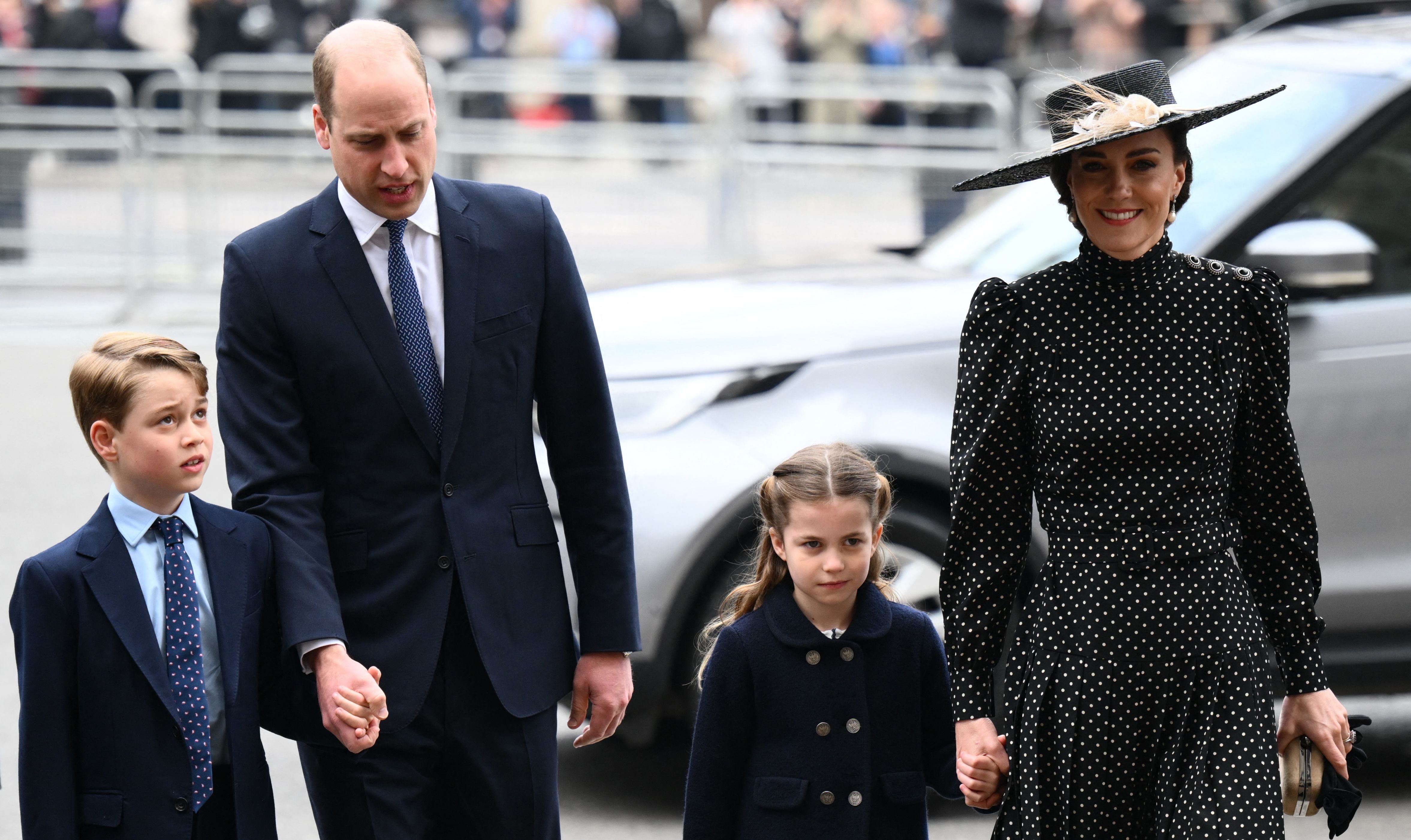 Prince William, Duke of Cambridge (L), Catherine, Duchess of Cambridge (R) and their children Prince George of Cambridge (L) and and Princess Charlotte of Cambridge arrive to attend a Service of Thanksgiving