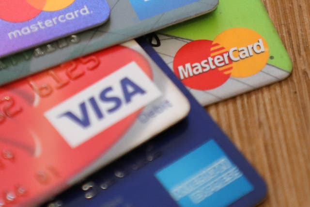 Households leaned on their credit cards for support in February, as consumer credit borrowing grew at the fastest annual pace in two years (Andrew Matthews/PA)