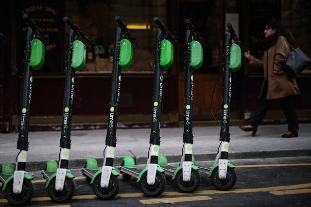 <p>Electric scooters parked in a Paris street. </p>
