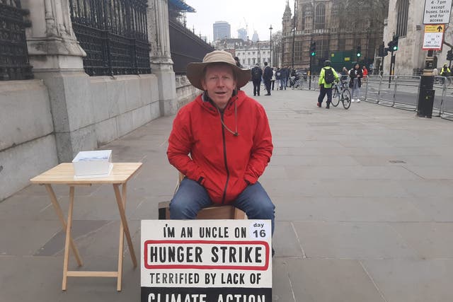 <p>Angus Rose is hunger striking outside of parliament calling for a public briefing on the climate crisis</p>