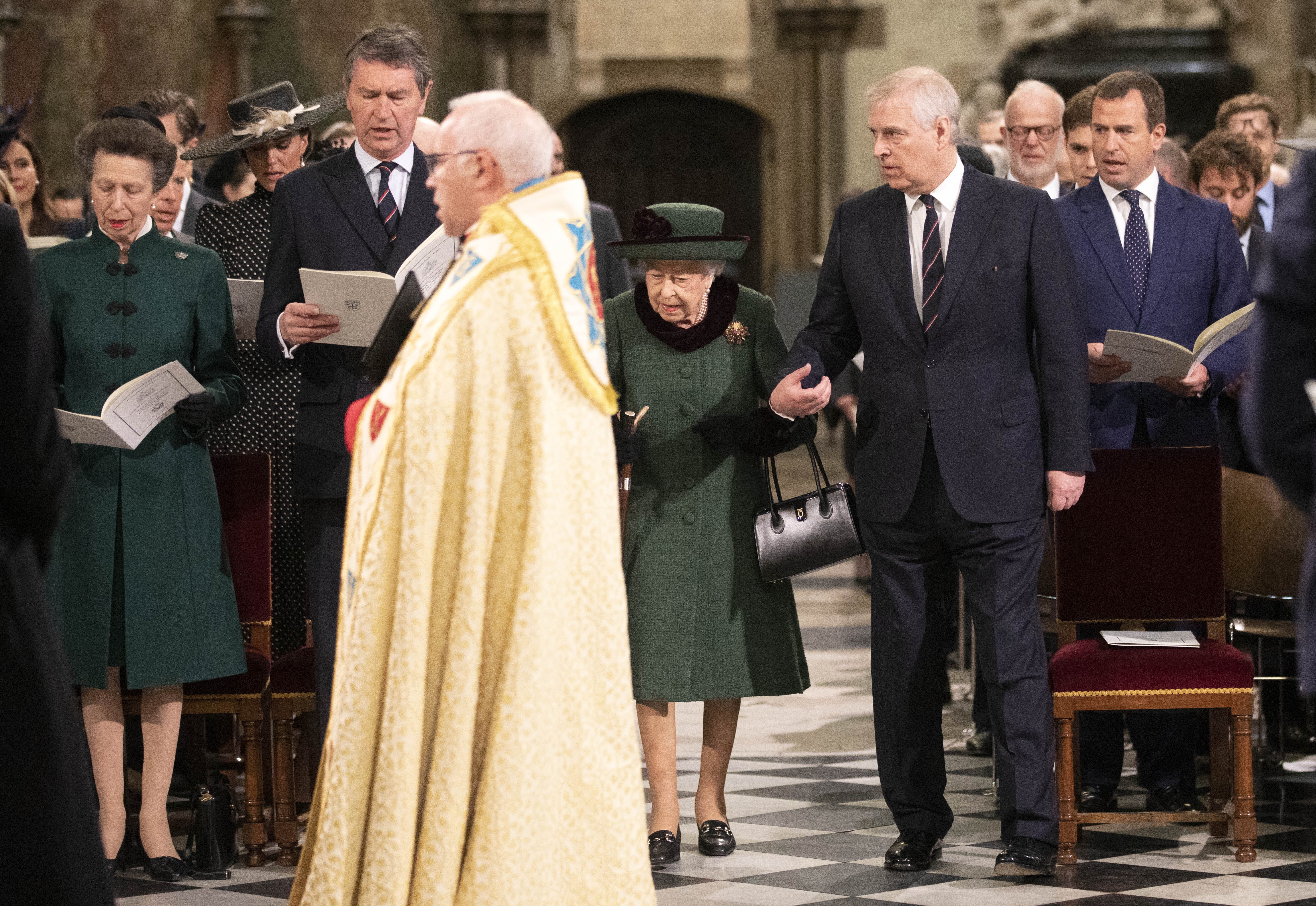 Queen Elizabeth II and the Duke of York arrive at a Service of Thanksgiving for the life of the Duke of Edinburgh, at Westminster Abbey in London (PA)