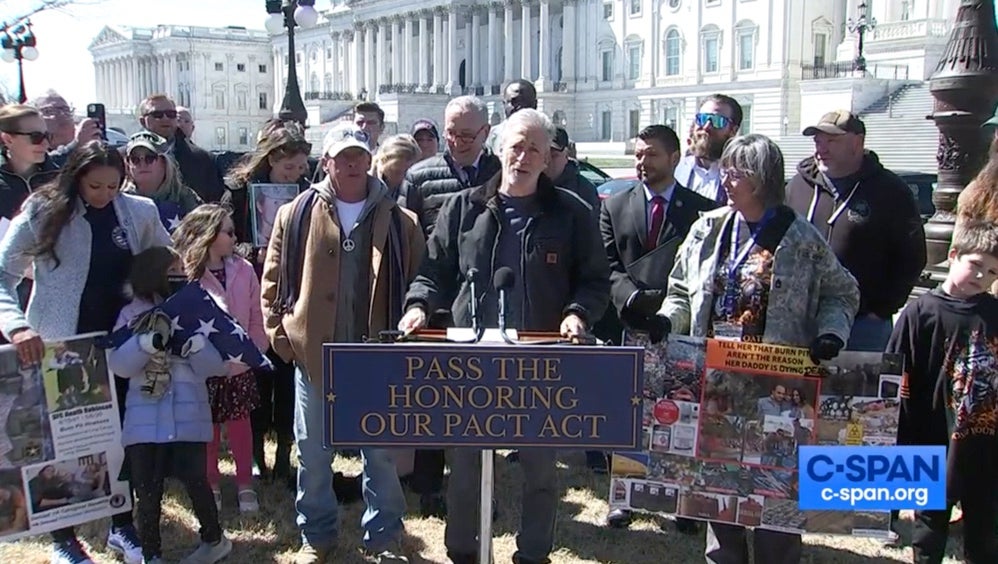 Jon Stewart speaks at a press conference on Tuesday along with veteran advocates and lawmakers urging to pass a burn pits bill