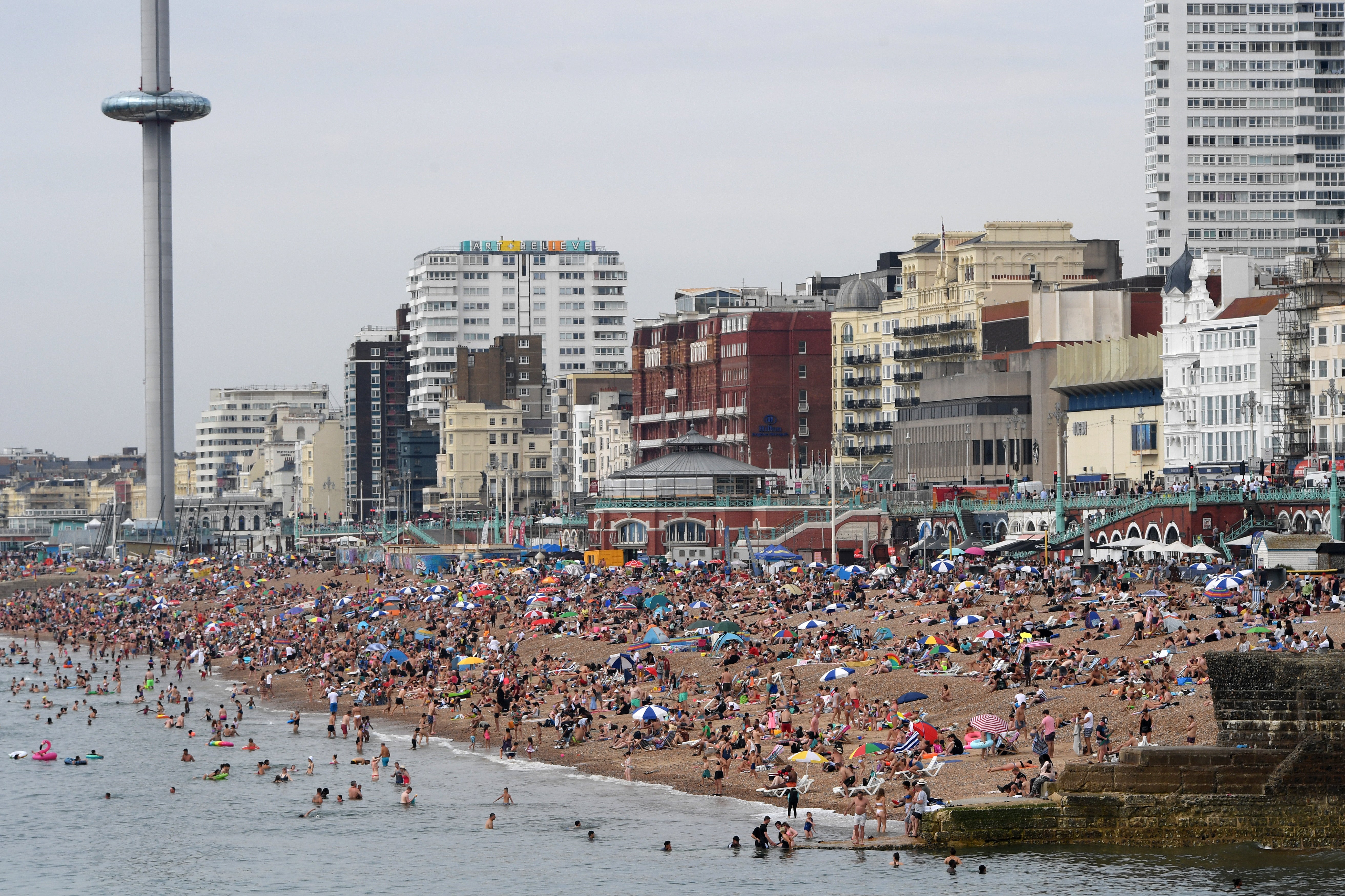 Brighton beach is packed as Britain experiences a three-day summer heatwave in August 2020, with temperatures reaching up to 38C in the South East