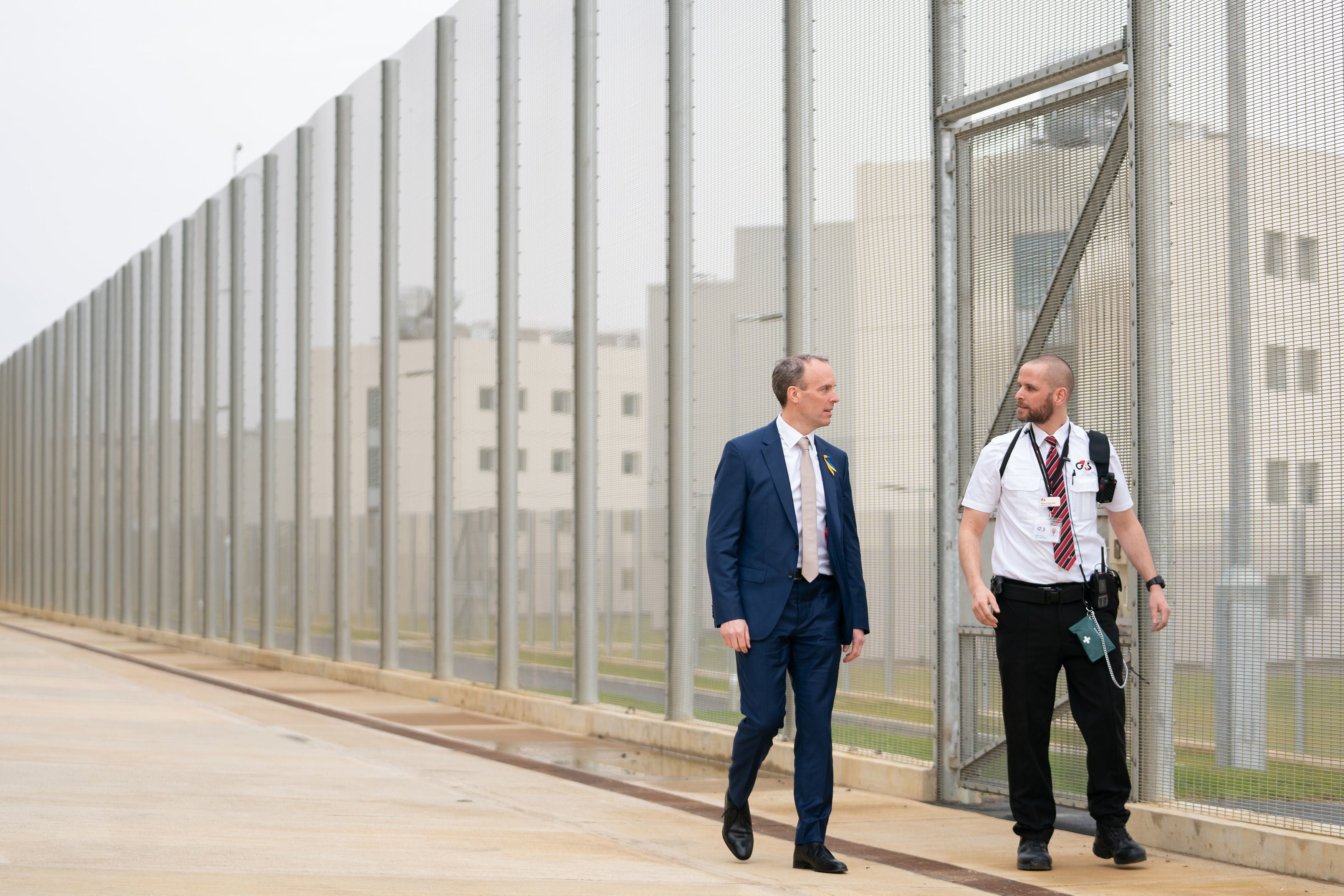 Dominic Raab with a prison officer at the opening of category C prison HMP Five Wells in Wellingborough (Joe Giddens/PA)