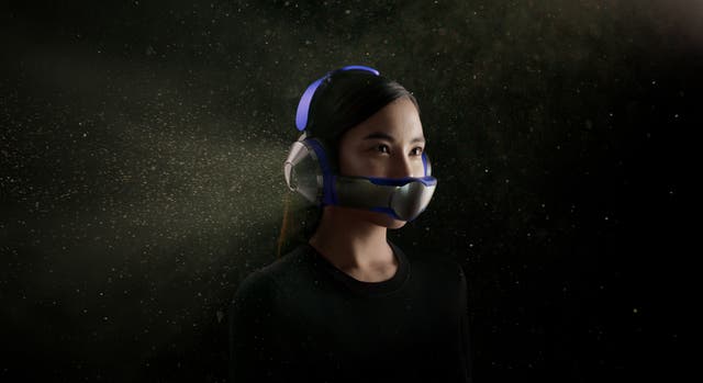 Dyson has created a pair of headphones that also includes an air-purifying visor designed to help people avoid polluted air in cities (Dyson/PA)