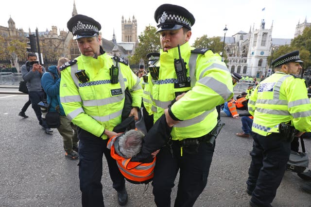 <p>Climate activists Insulate Britain said 117 supporters have been charged over its road-blocking protests </p>