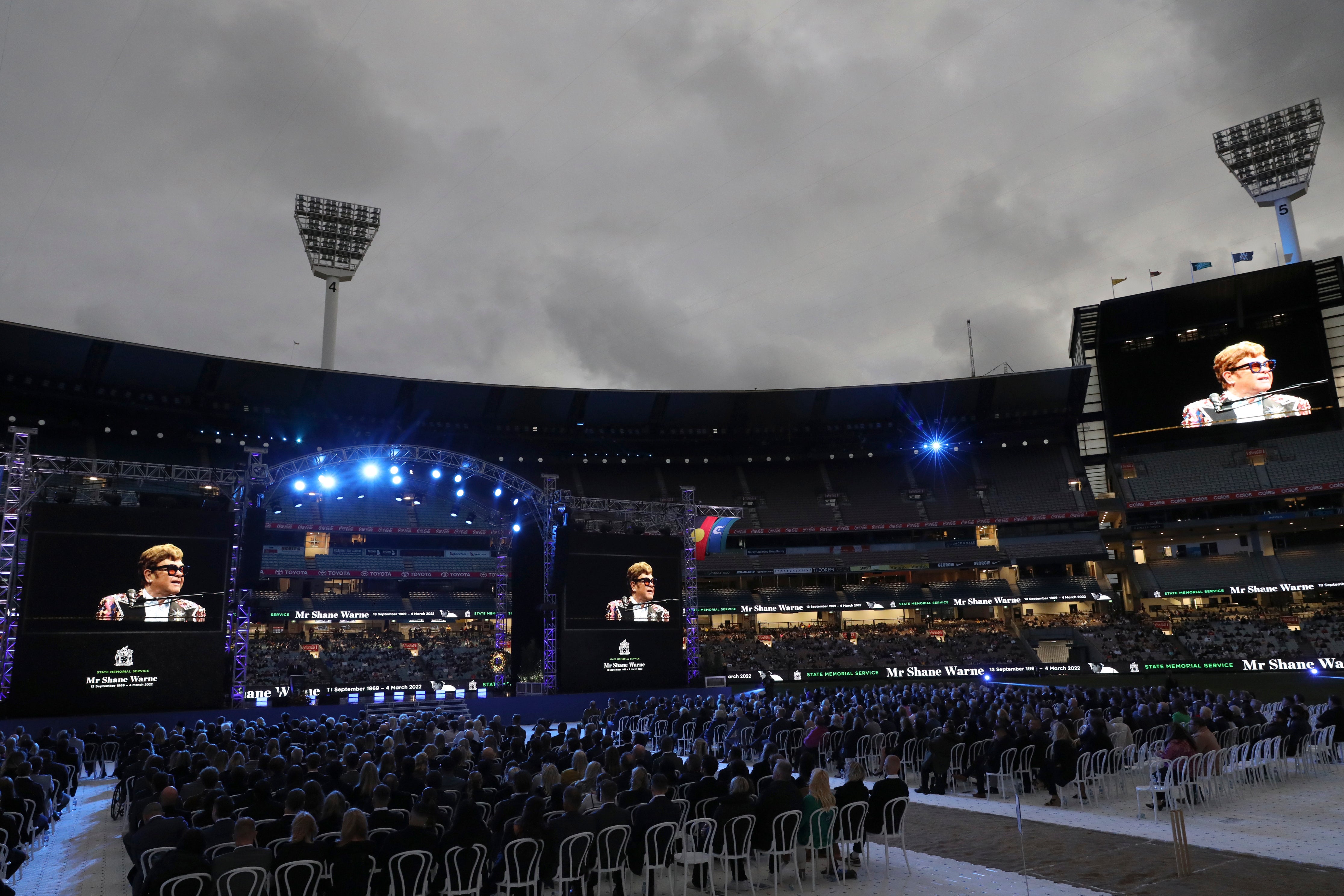 A performance by Elton John was projected on to screens during the service (Asanka Brendon Ratnayake/AP)