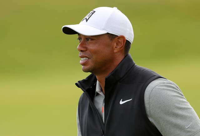 Tiger Woods is set to decide if he can compete in the 86th Masters (Richard Sellers/PA)