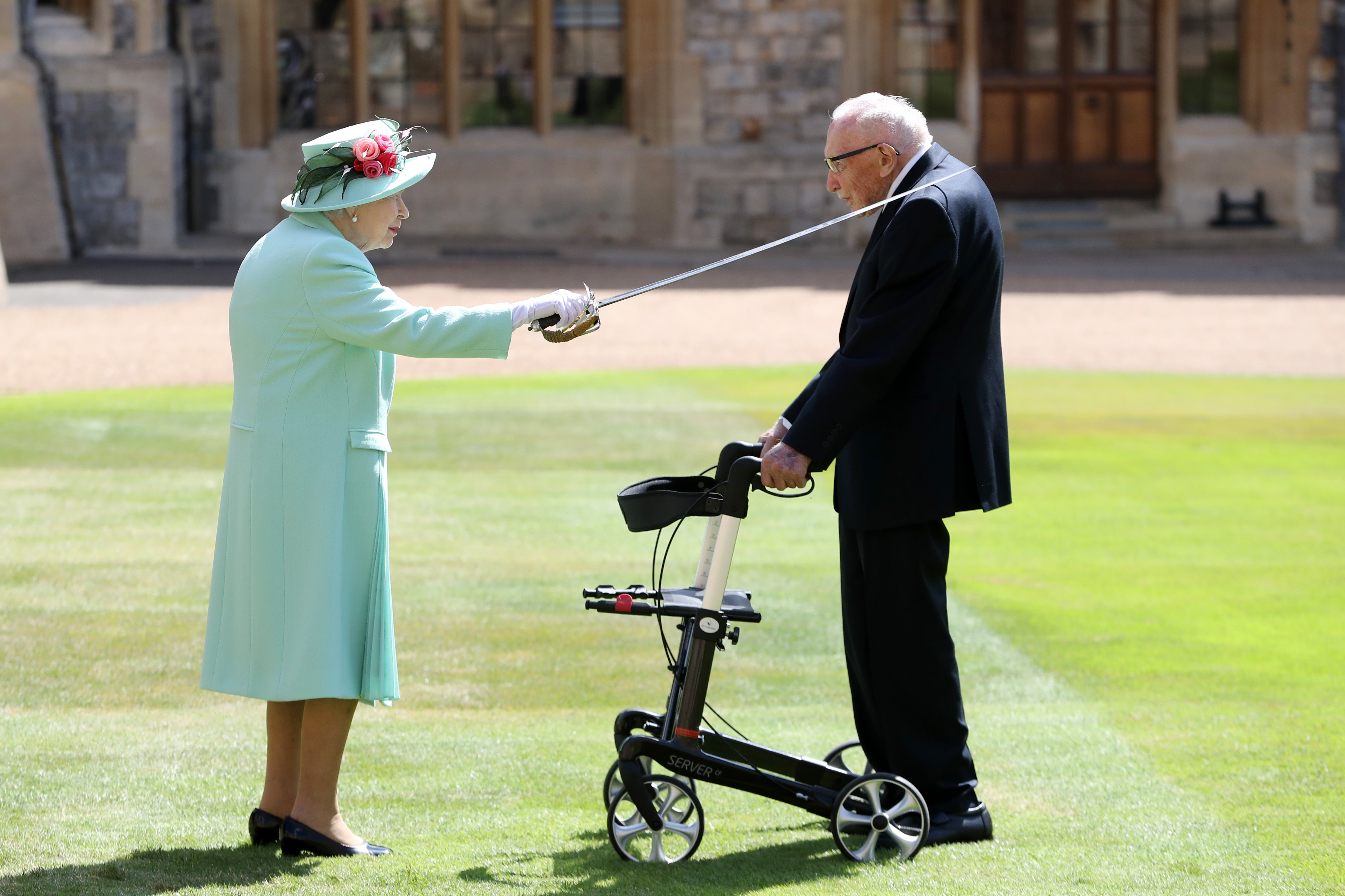 Captain Sir Tom Moore was knighted by the Queen for his fundraising efforts (Chris Jackson/PA)