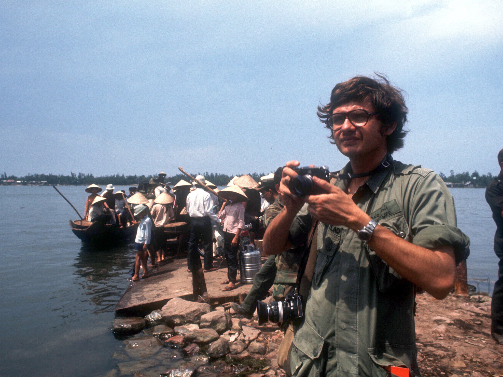 Dirck Halstead takes a picture in Hue, Vietnam, 22 May 1972