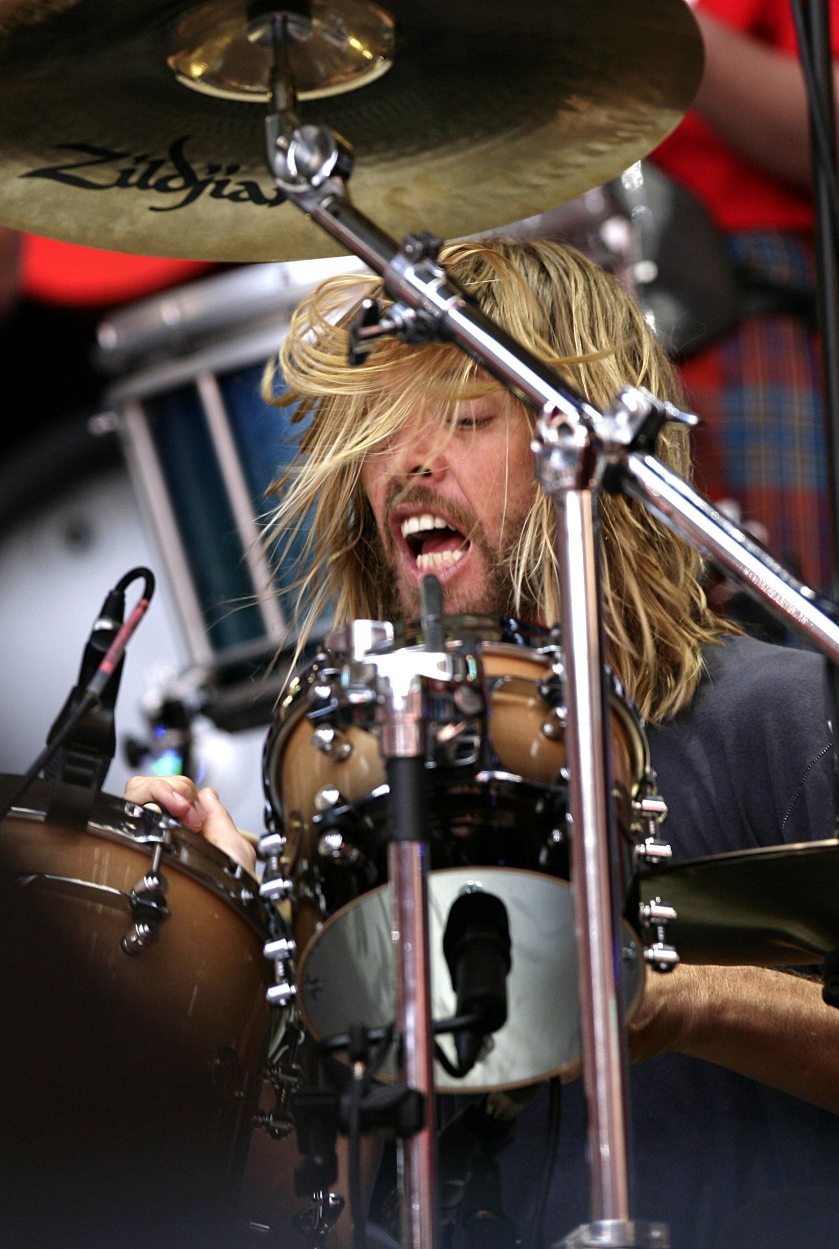 Taylor Hawkins performs during a charity concert at Wembley Stadium (PA)