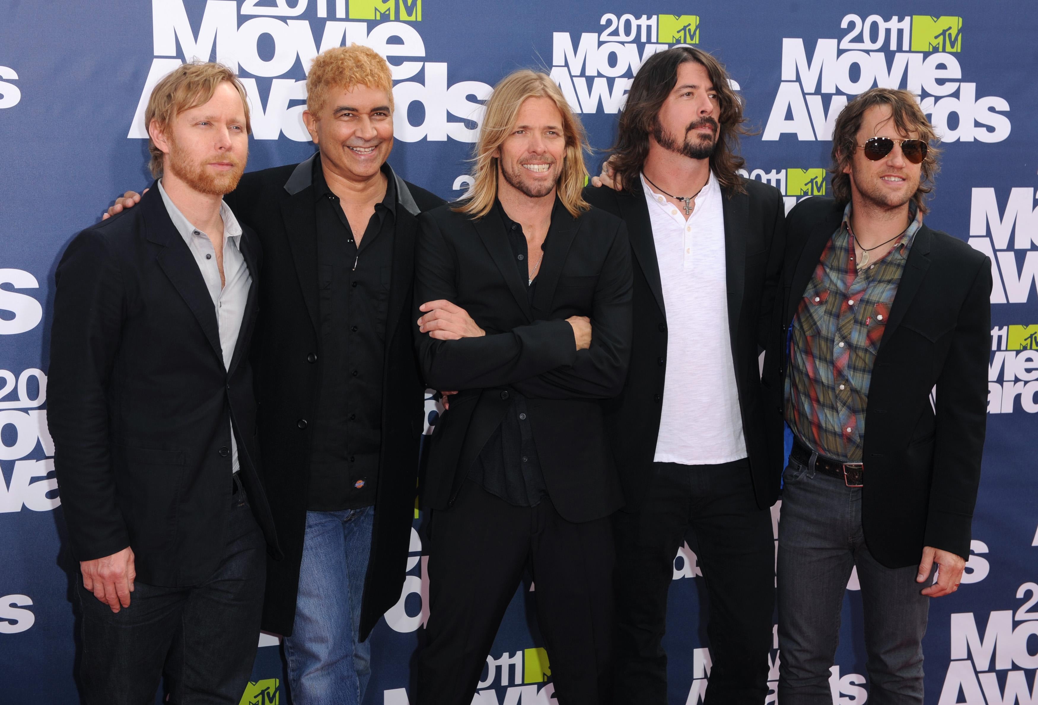 Taylor Hawkins with his Foo Fighters band mates (left to right) Nate Mendel, Pat Smear, Taylor Hawkins, Dave Grohl and Chris Shiflett (PA)