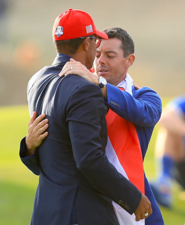 Rory McIlroy (right) believes it would be “phenomenal” if Tiger Woods (left) can compete in the Masters (Gareth Fuller/PA)