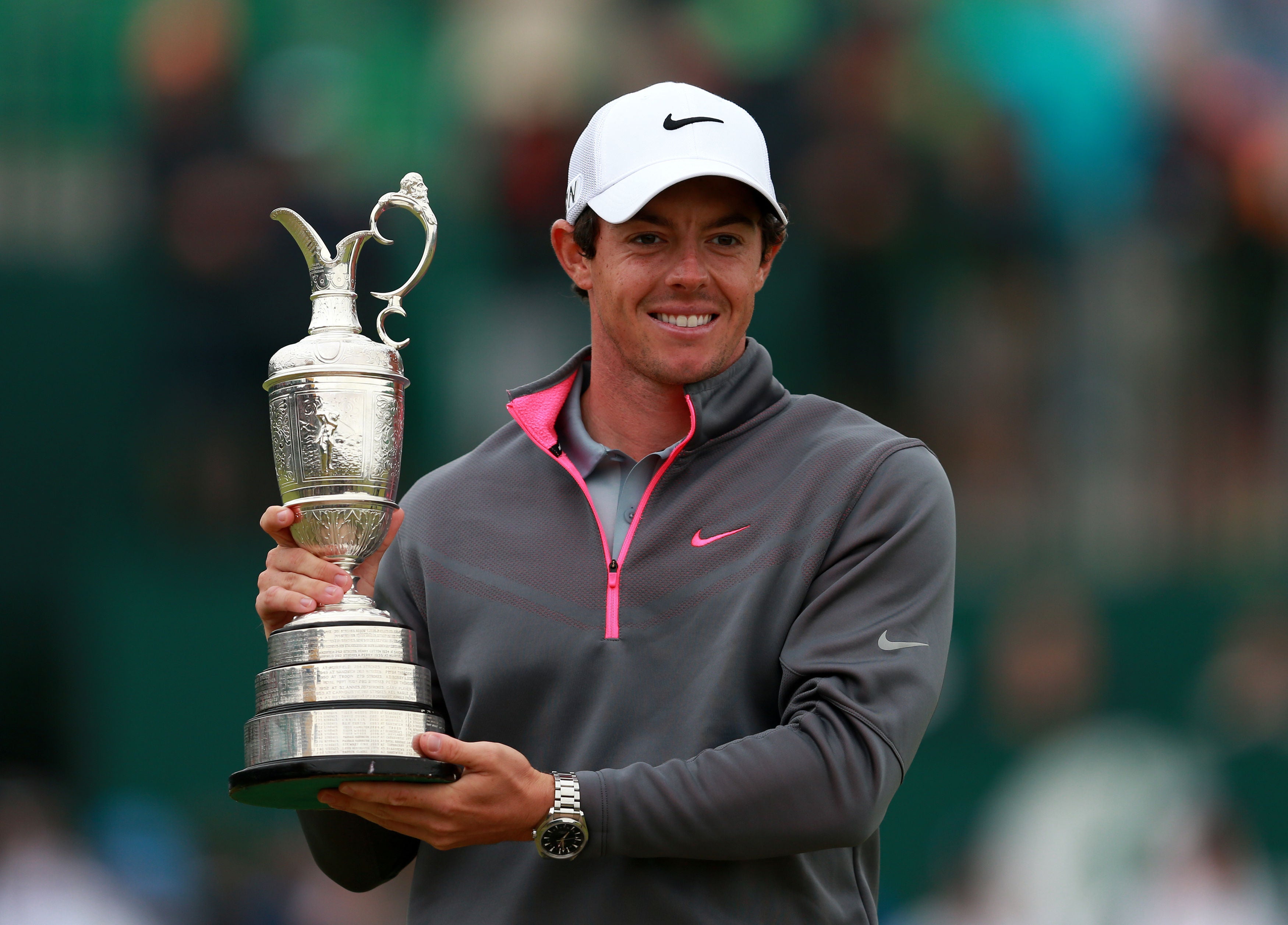 Rory McIlroy celebrates with the Claret Jug after winning the 2014 Open Championship (David Davies/PA)