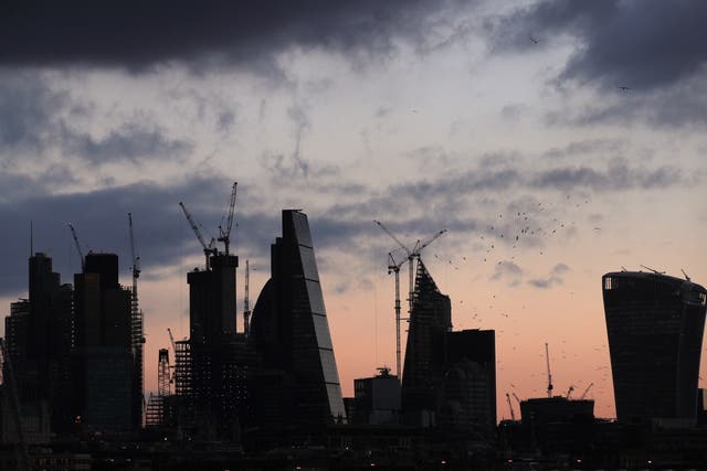 A view of the City of London skyline before sunset. London stocks finished higher on Wednesday (Yui Mok/PA)