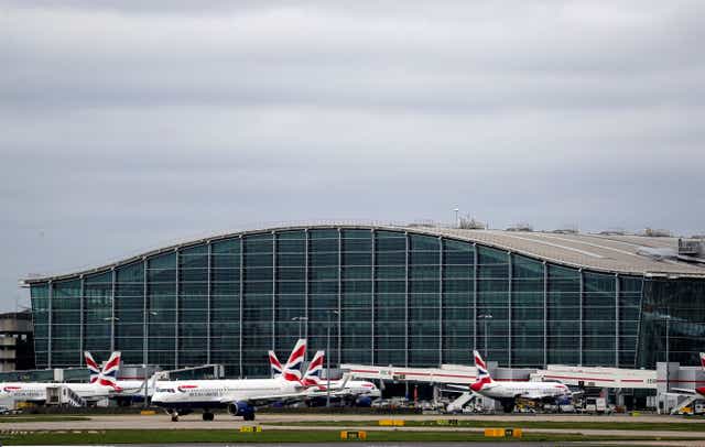 British Airways planes at Heathrow Terminal 5 (Steve Parsons/PA)