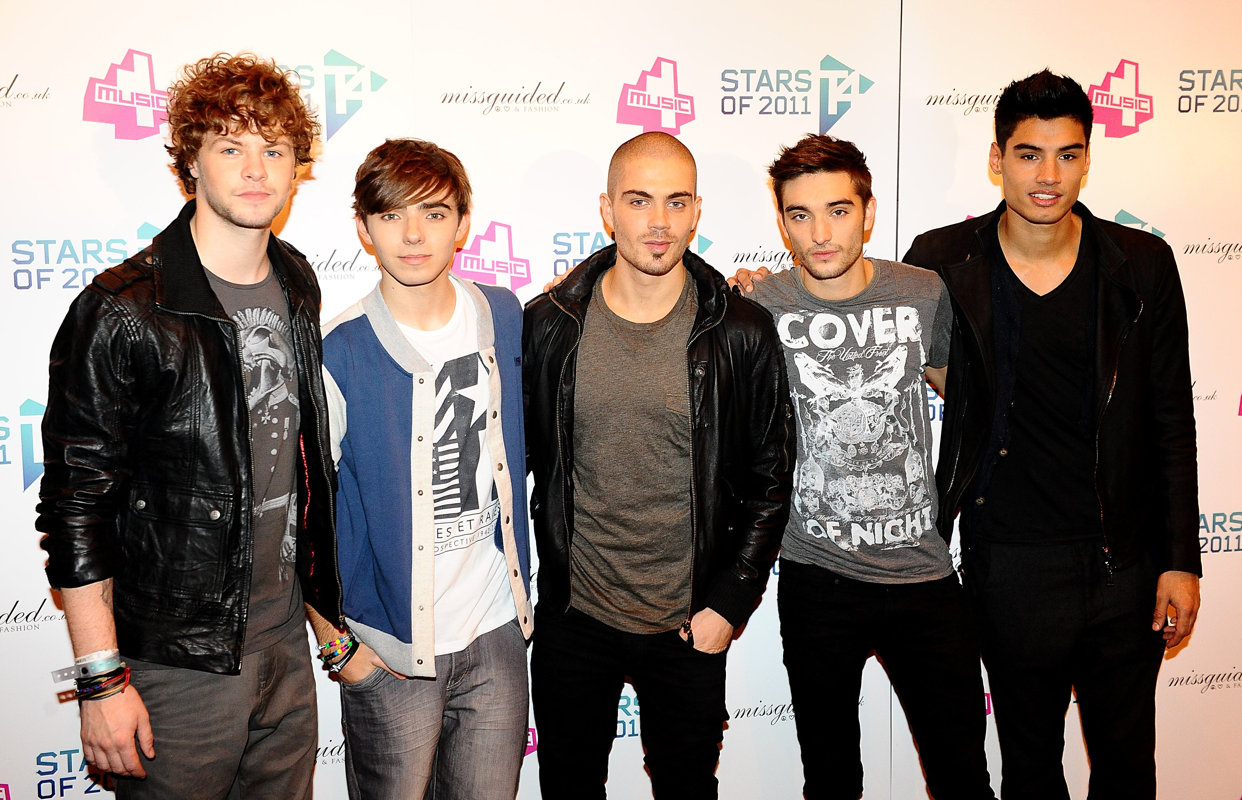 Tom Parker with his bandmates from The Wanted (PA)