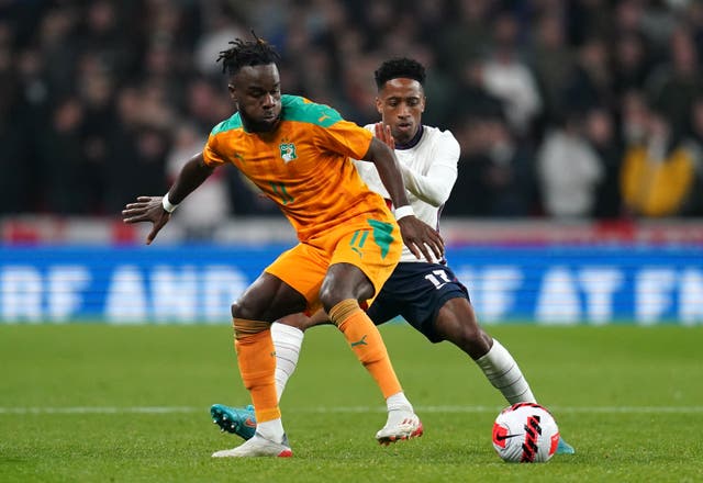 <p>England defender Kyle Walker-Peters, right, came off the bench against Ivory Coast after making his international debut against Switzerland</p>