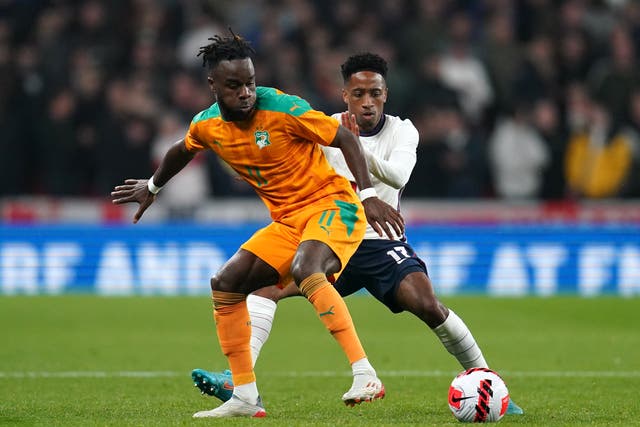 <p>England defender Kyle Walker-Peters, right, came off the bench against Ivory Coast after making his international debut against Switzerland</p>