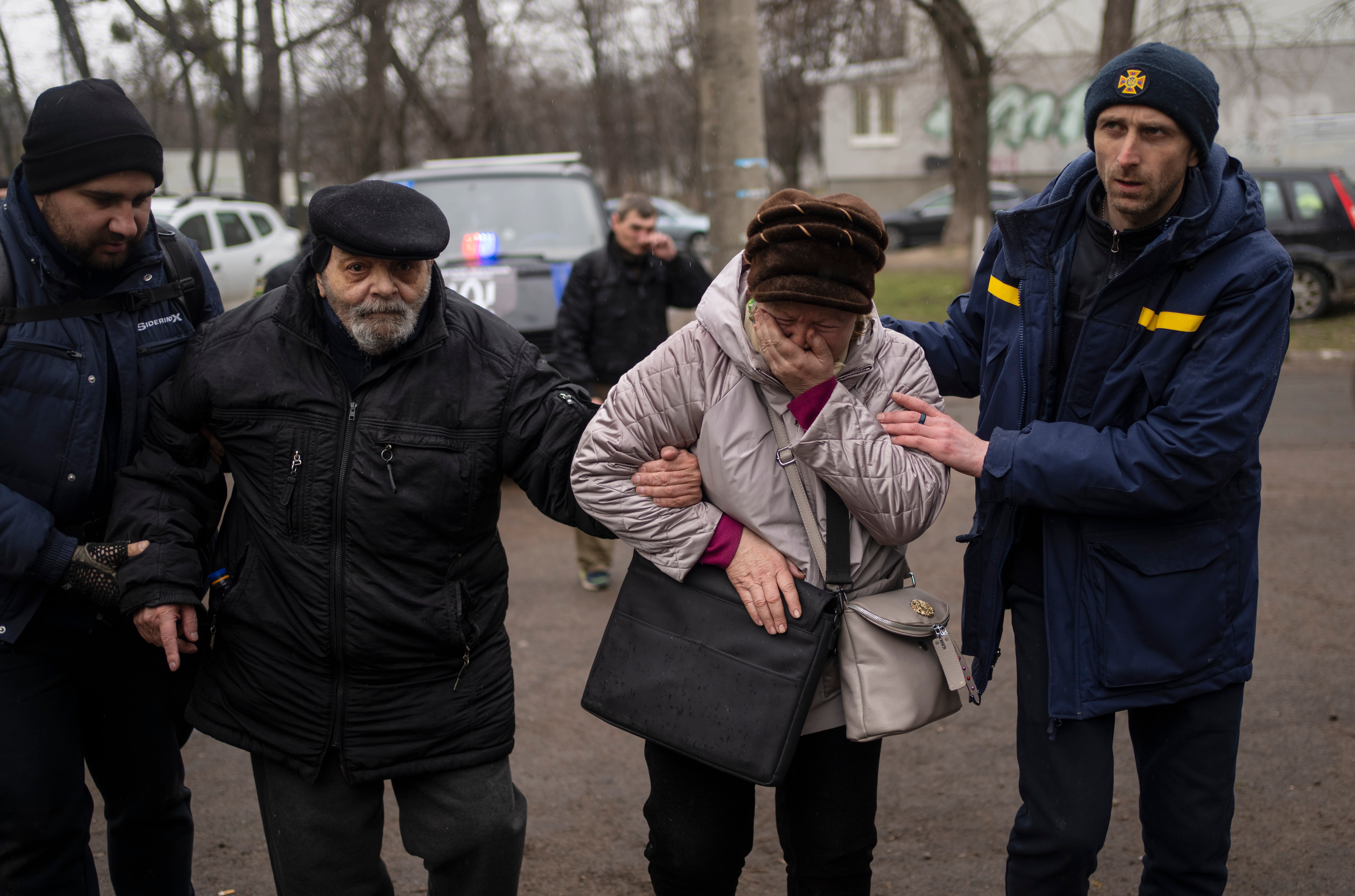 Residents evacuated from Irpin arrive at an assistance centre on the outskirts of Kyiv on Wednesday