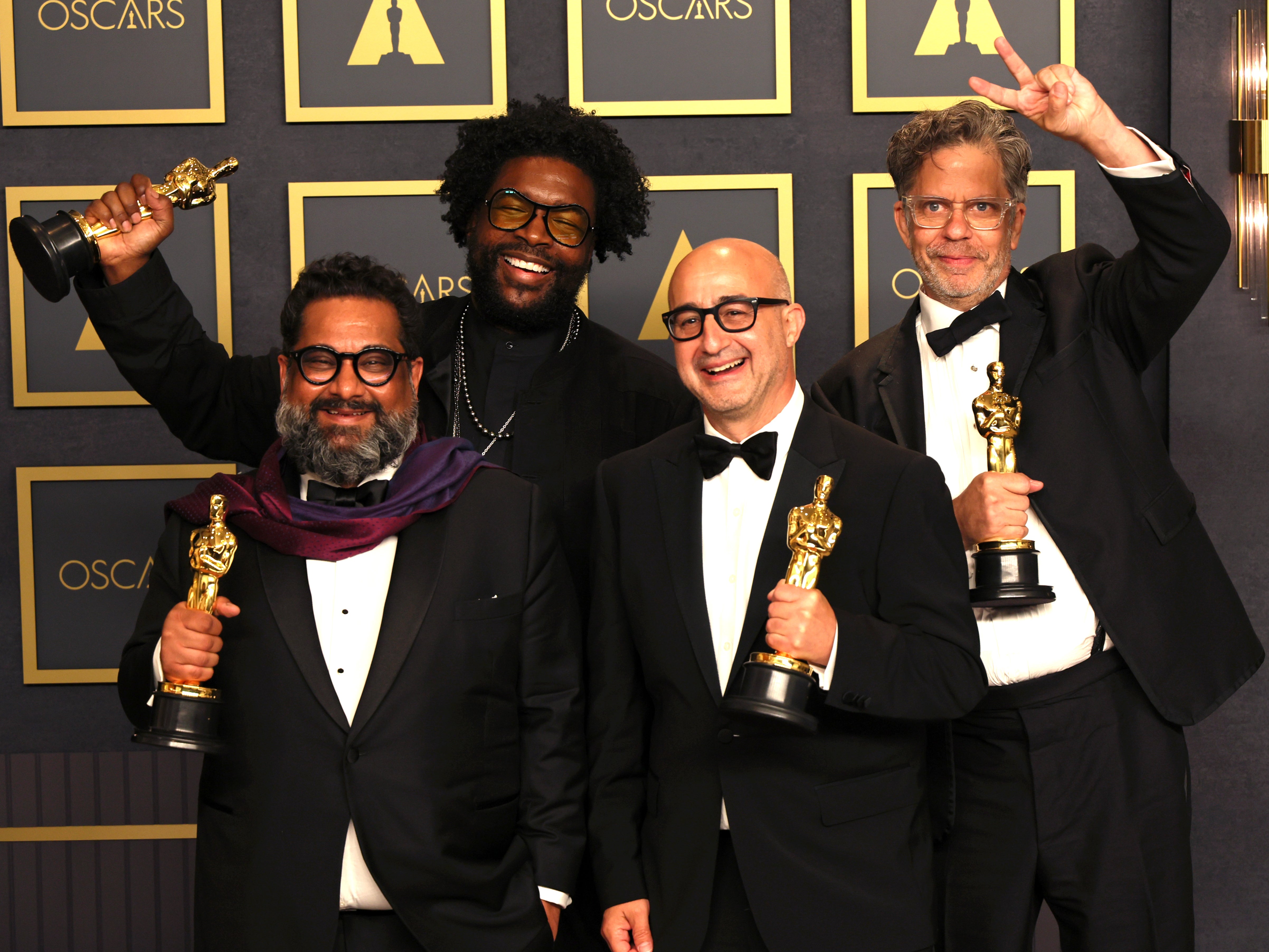 The ‘Summer of Soul’ team after winning an Oscar