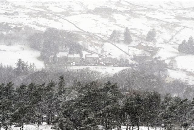 <p>A blizzard in Nenthead, one of England's highest villages, in Cumbria</p>